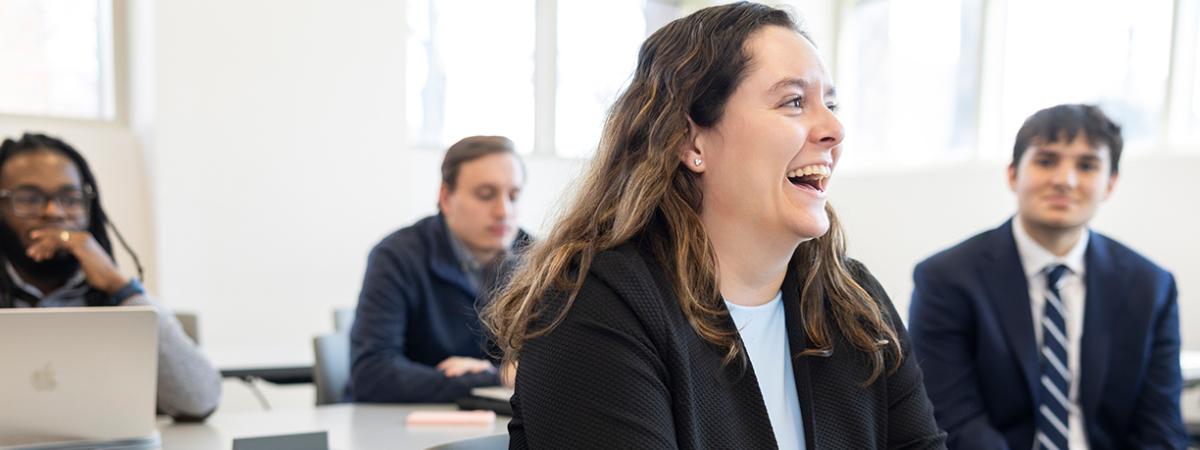Law students participating in a lively and collaborative classroom.
