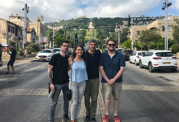 Four Law Students on a Summer Externship in Ramallah posing for a picture in the street