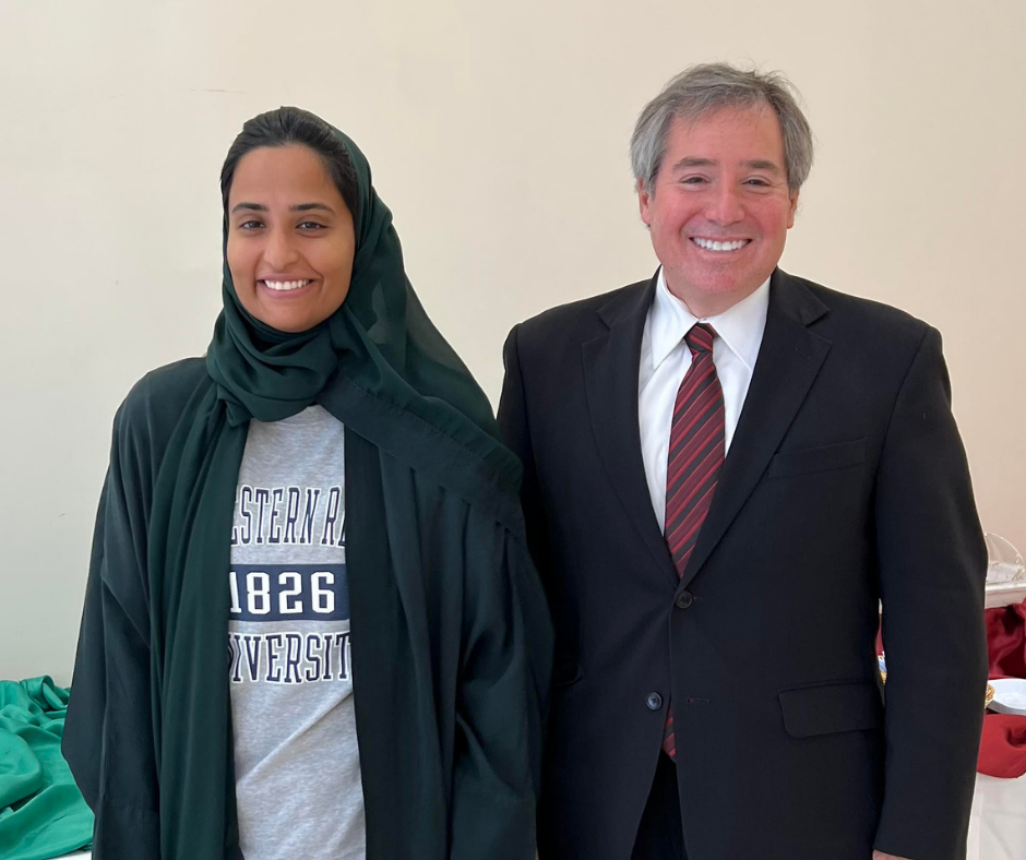 student and Dean Scharf in Saudi Arabia