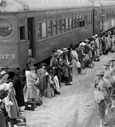 People standing in line in a black and white photo