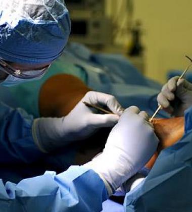 Physicians operating on a patient