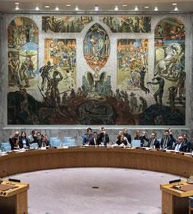 Several law and policy experts at a round table conference