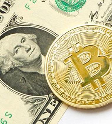 Close up image of dollar and coin