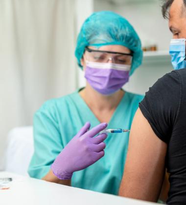 photo of a person being vaccinated
