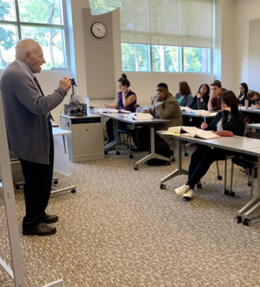 Leon Gabinet teaching in the classroom