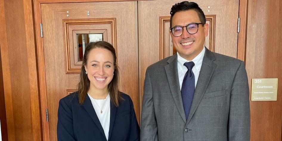 Senior Fellow Sara Coulter and Director Andy Geronimo standing in front of the Thomas D. Lambros Federal Building and U.S. Courthouse in Youngstown, Ohio, after a multi-day federal bench trial chaired by Certified Legal Externs.