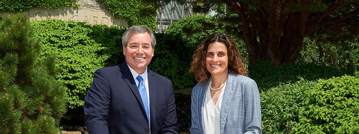 The deans sitting outside of the CWRU Law school