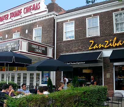 street view of people outside historic shaker square area, with shaker square cinemas and zanzibar restaurant