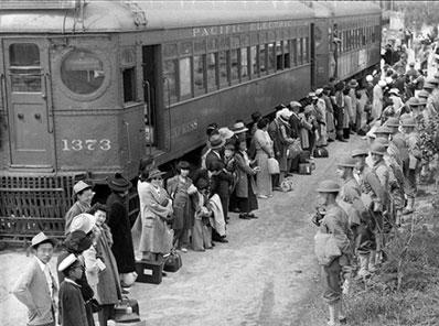 People standing in line in a black and white photo