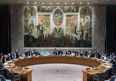 Several law and policy experts at a round table conference