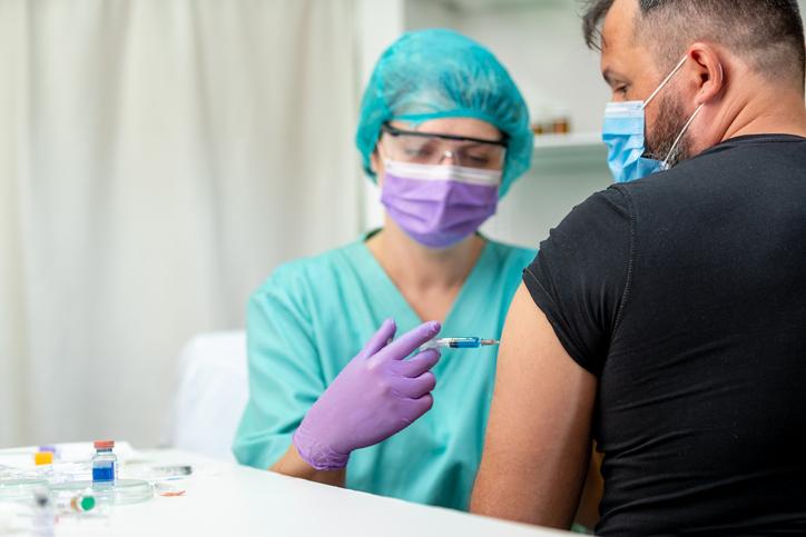 photo of a person being vaccinated