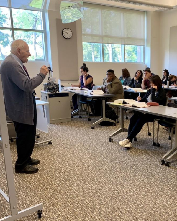 Leon Gabinet teaching in the classroom