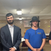 Students Emma Geesaman and Matthew Koutsky with organizers Damian Powell and Thomas Powell 