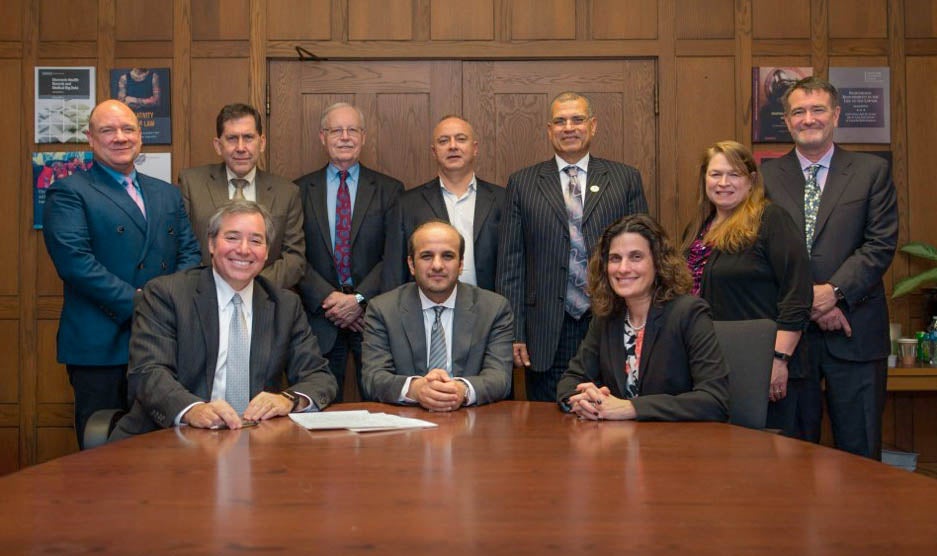 Leaders of CWRU School of Law and NAUSS sign an agreement paving the way for offering the MAFI program at NAUSS.