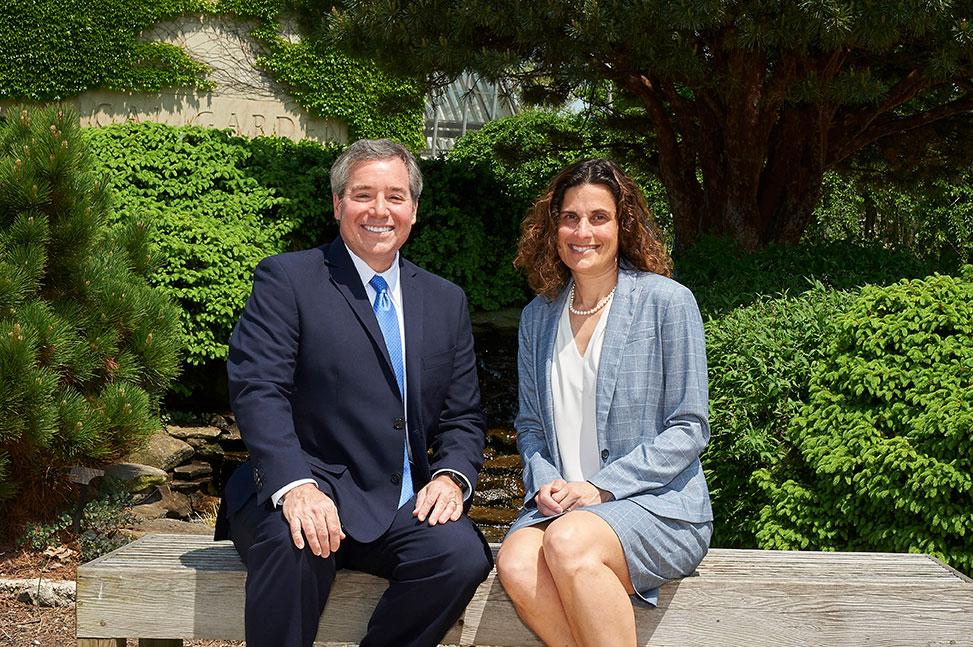The deans sitting outside of the CWRU Law school
