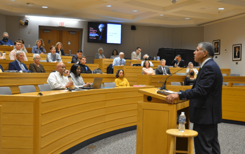 Lecturer speaks to students, faculty and local attorneys in the law school moot courtroom