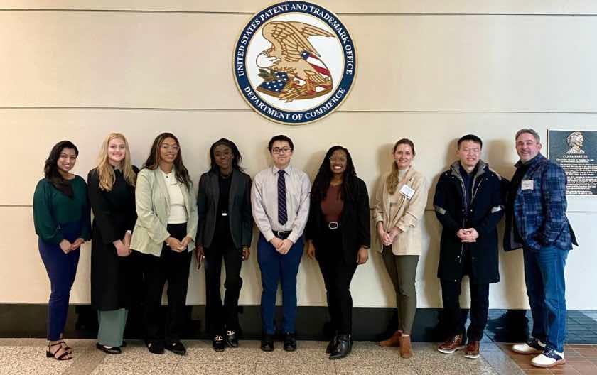 IVPC students in front of United States Patent and Trademark Office seal