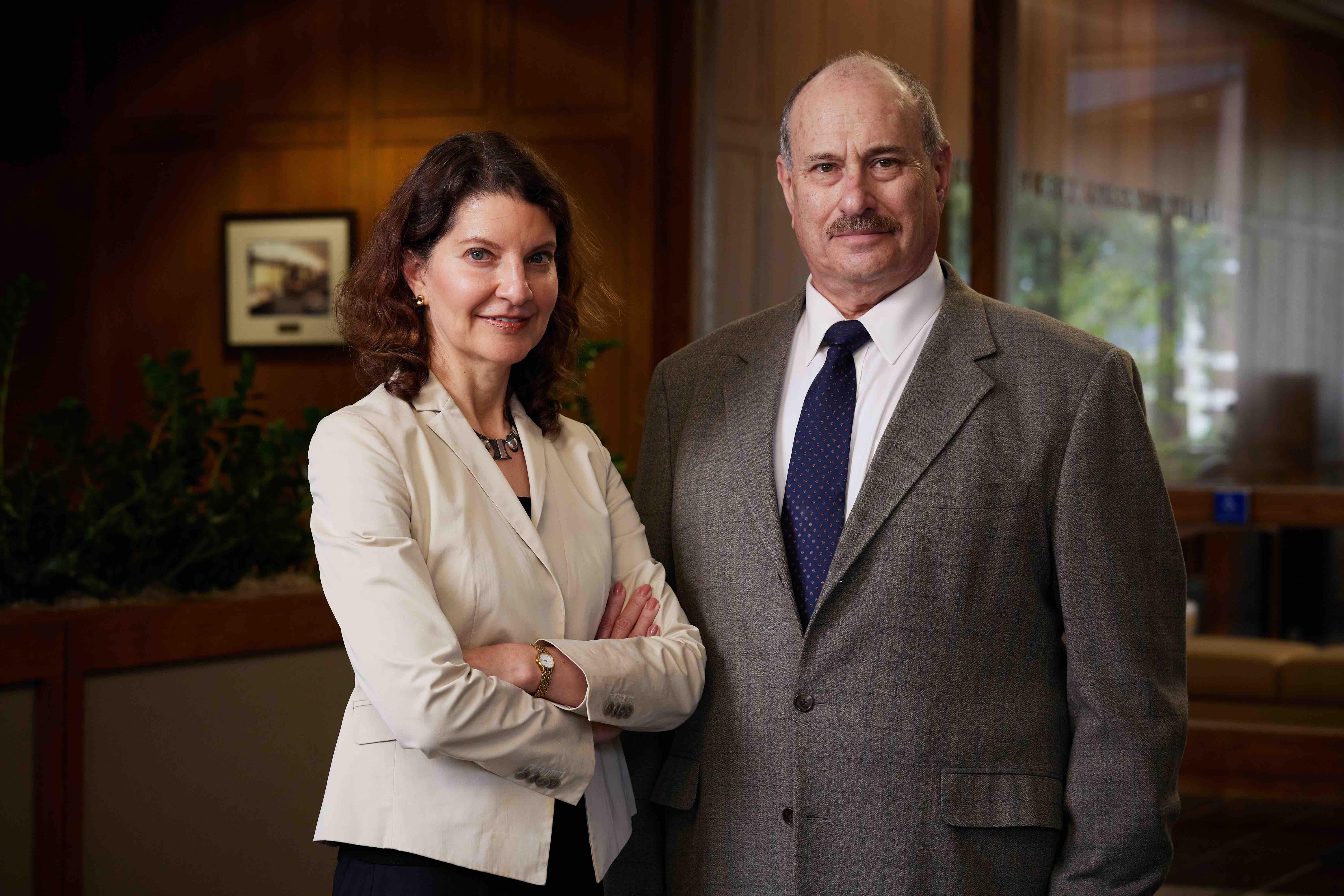 Sharona Hoffman and Max Mehlman standing in the law school lobby