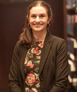 Julia Aromatorio headshot in the law library