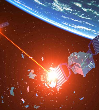 Laser Weapon Destroys Satellite In Outer Space - stock photo