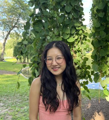 Clare Soria photo taken outside in front of greenery