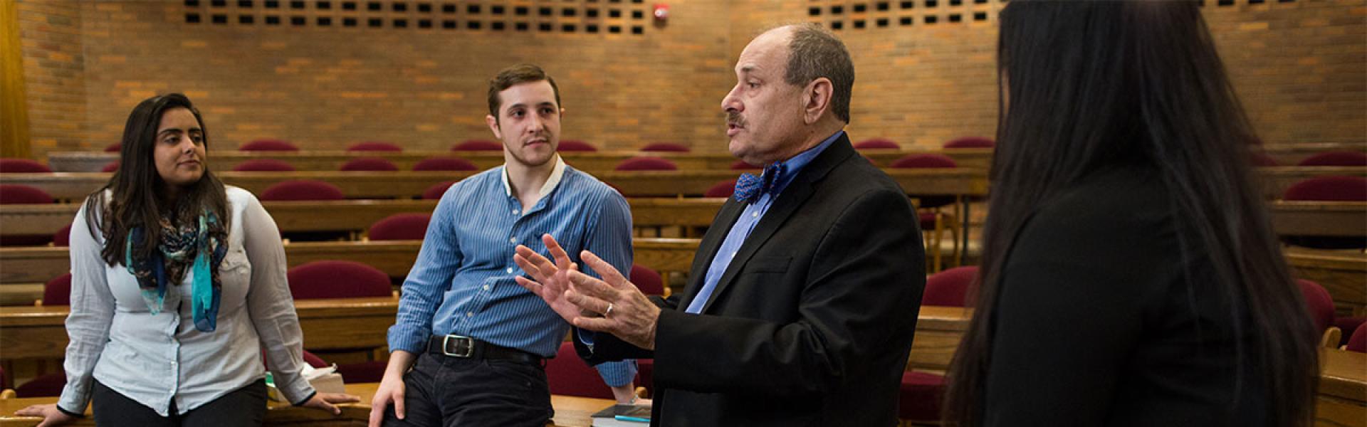 A CWRU Law faculty member talking to law students