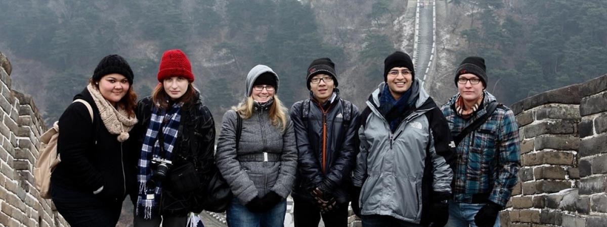 six case western reserve university aw students standing on the great wall of china