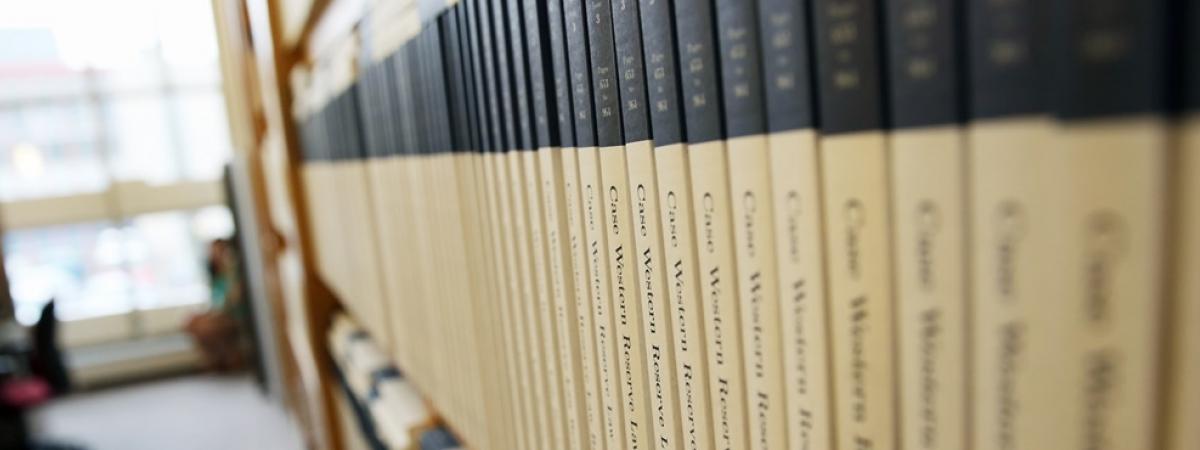 image of case western reserve law journal shelved in a long row in a library setting
