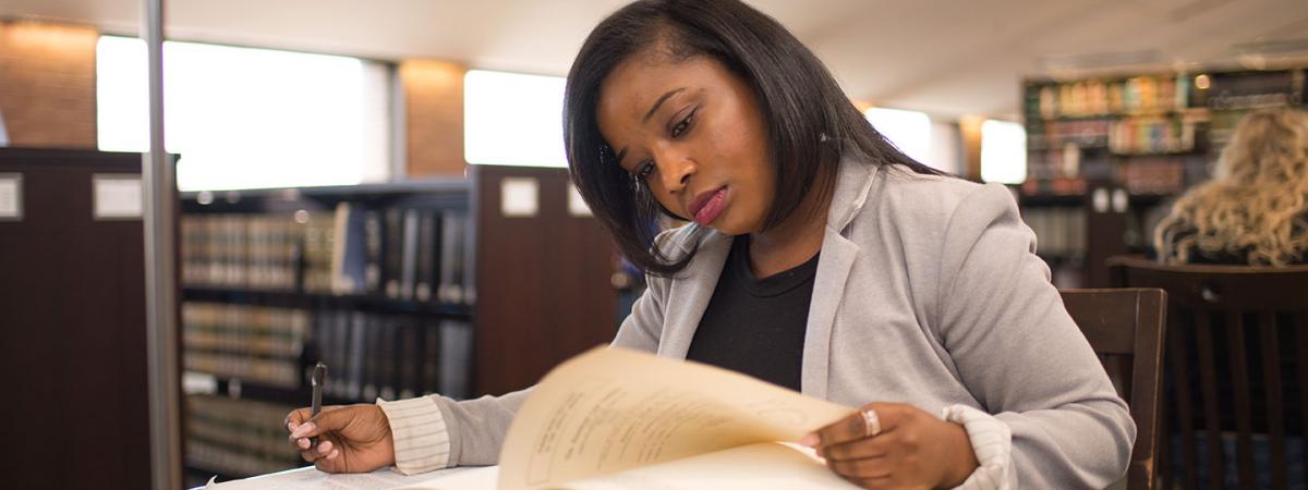 Case Western Reserve Law student working in the library