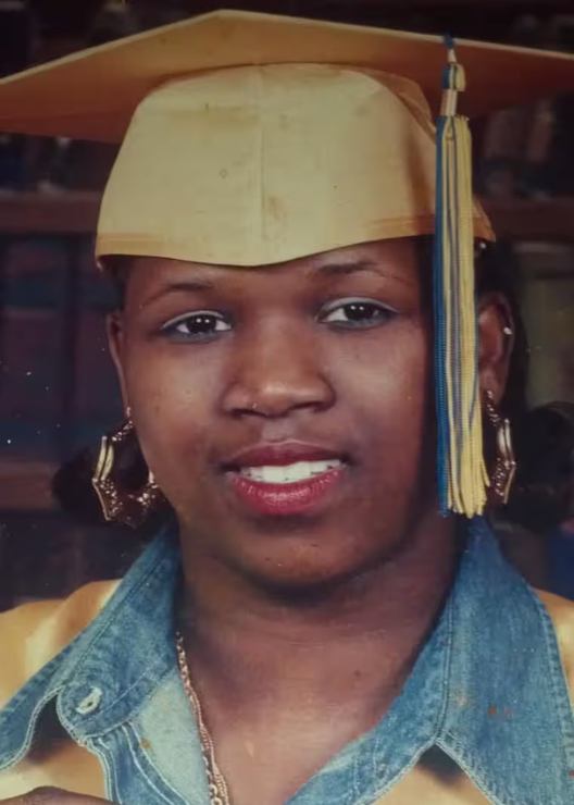 Tanisha Anderson in yellow cap and gown