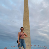 Student Emma Kerro standing in front of Washington Monument