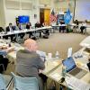 Experts gathered in one of the CWRU classrooms around a large U-shaped table