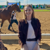 Jilly Fox at an equestrian event, smiling at the camera