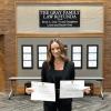 Jenna Chirichetti in the Upper Rotunda with her certificates