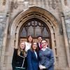 2025 ICC moot court team standing in front of old stone building