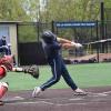 Jack Anderson hitting a baseball during a game