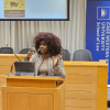 Conner standing in the Moot Courtroom during the presentation