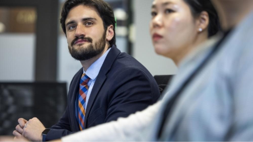 Two students in suits.