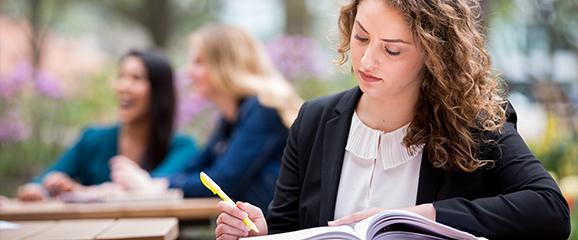 student studying outside