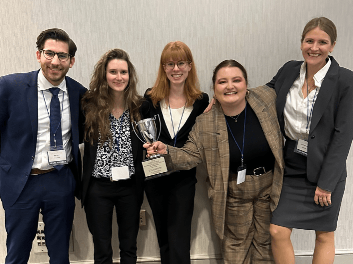 Jessup Team at their recent national competition, holding the first place trophy