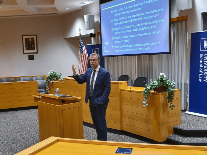Eric Talley speaking in the Moot Courtroom
