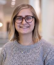 Stephanie Becker in the library atrium