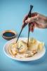 Dumplings and Chopsticks Image by Barney Taxel