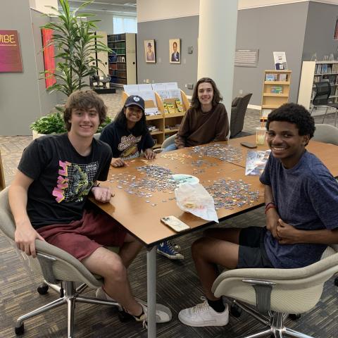 Students building a puzzle in the zen zone