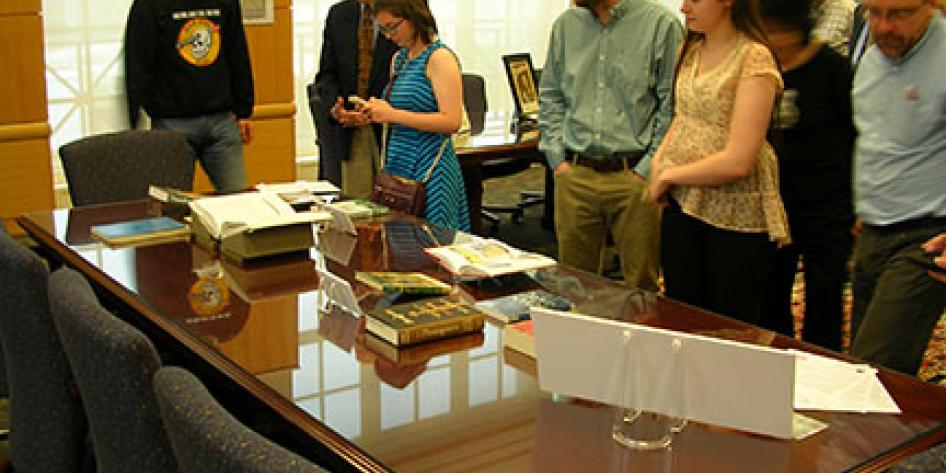 People viewing books on display