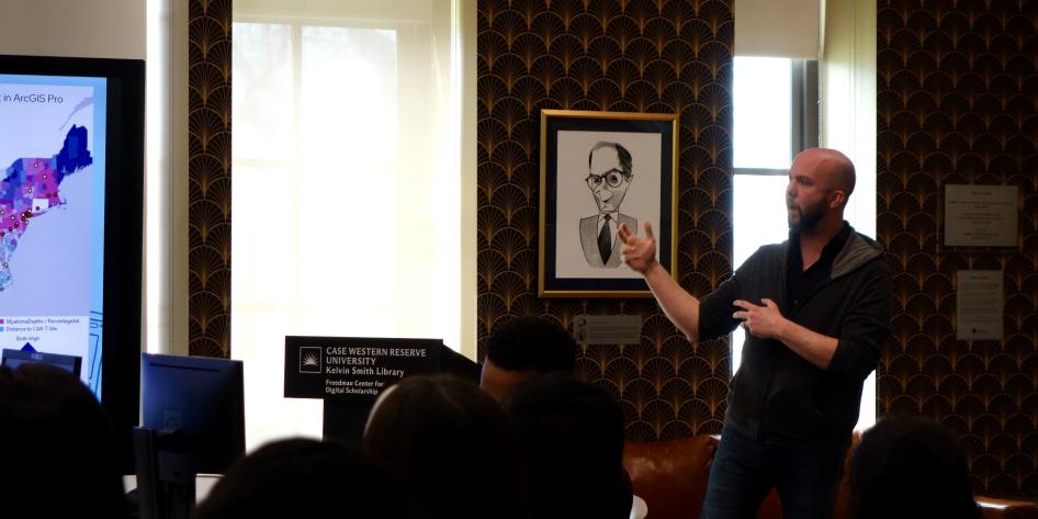 Staff member gives presentation in Freedman Center