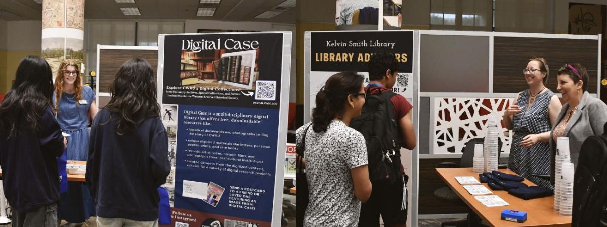 students interacting with library staff at info fair