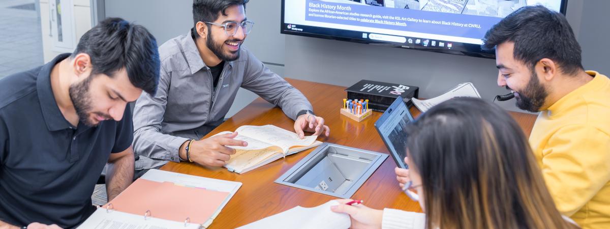 students collaborating in study space