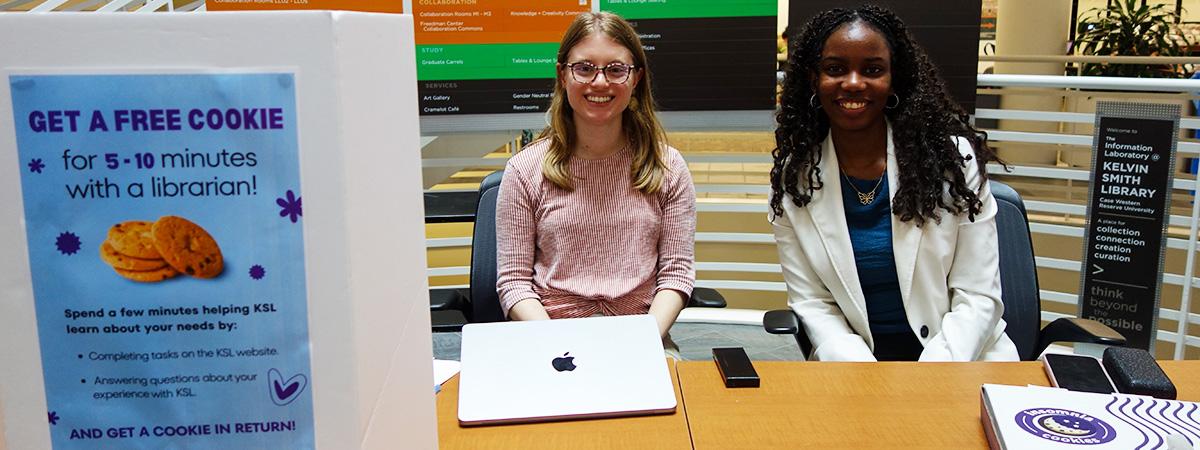 Librarian and student sit at an engagement table at Kelvin Smith Library