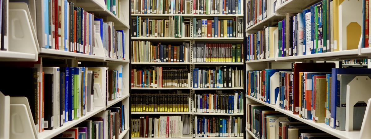 Bookshelves filled with books at Kelvin Smith Library